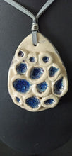 Load image into Gallery viewer, Coral-inspired ceramic pendant on cord
