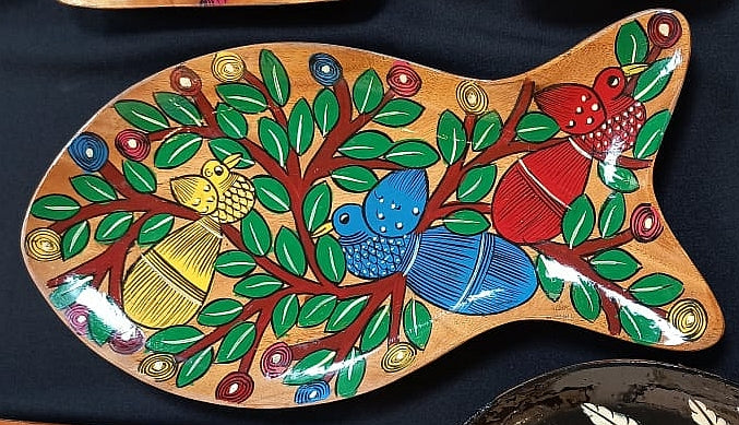 Fish shaped wooden platter with birds by Midnapore artist