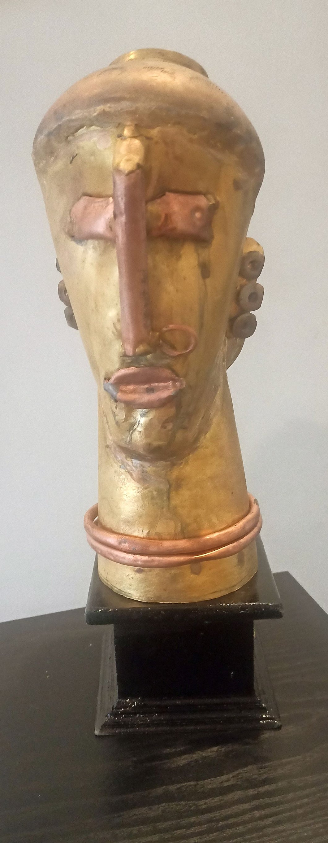 Head of a tribal woman : Mixed metal sculpture by Tapos Das