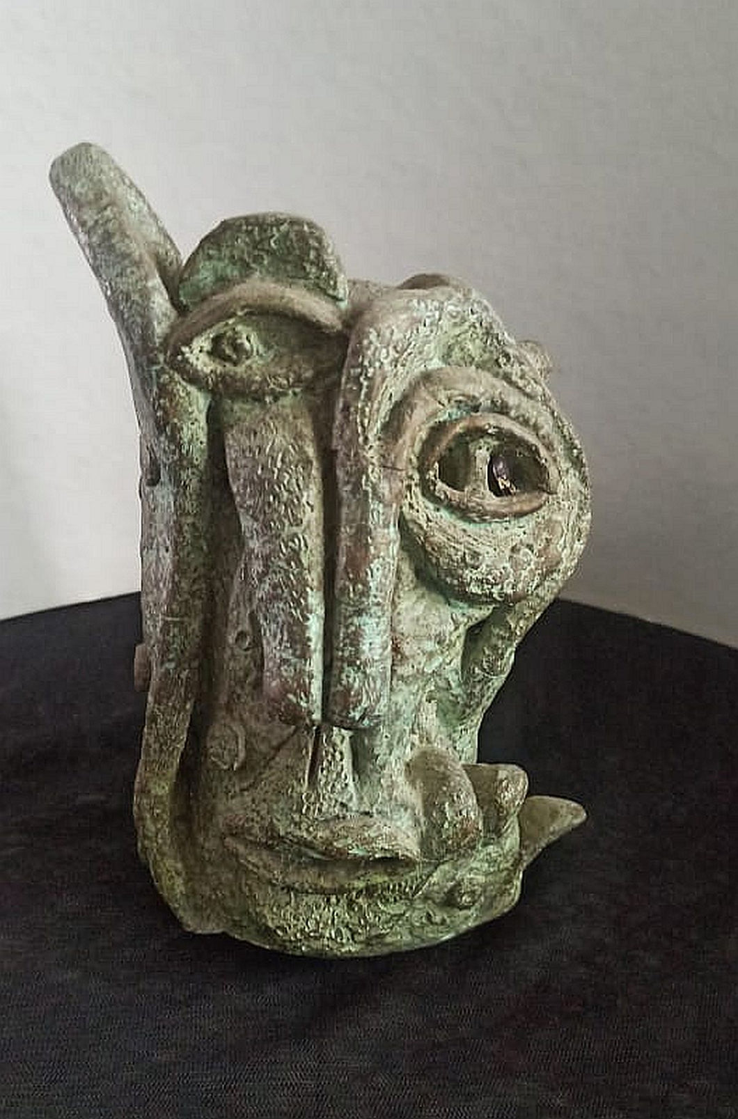 The Head : Small Metal sculpture by Atish Mukherjee